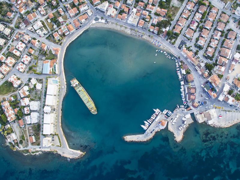 A lone ship traverses the harbor in Mordogan, a seaside township in Turkey's Izmir Province.