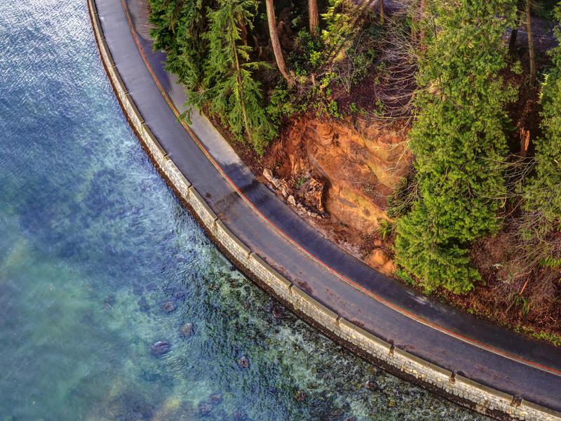 Stanley Park and the Pacific Ocean are divided by seawall in Vancouver.